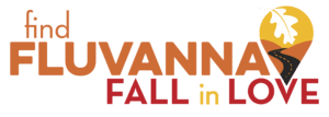 Autumn-colored and branded logo statement "Find Fluvanna, Fall In Love" with an oak leaf in a map pin logo