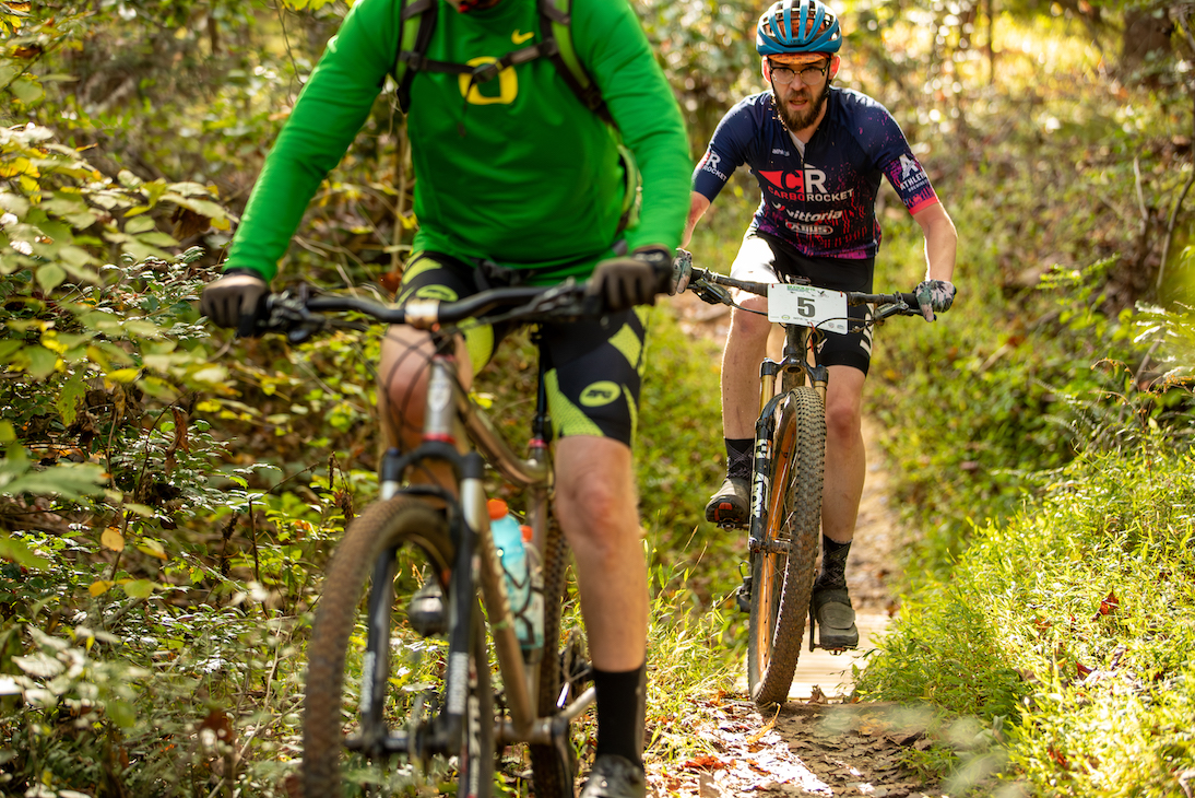 Mountain biker on the miles of single-track mountain biking trails in Virginia at Pleasant Grove Park in Fluvanna County.